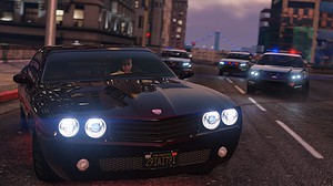 GTA 5 cheats - A player escapes the cops in a car in the game. Image from Rockstar Games.