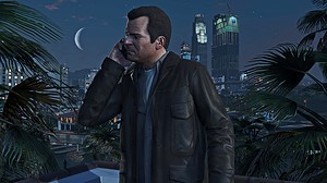 GTA Online make money - Michael speaks to someone on the phone in the game. Image from Rockstar Games.