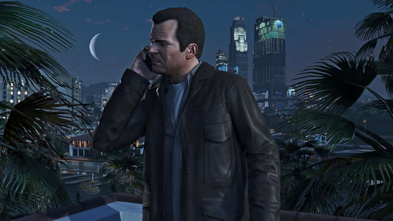 GTA Online make money - Michael speaks to someone on the phone in the game. Image from Rockstar Games.