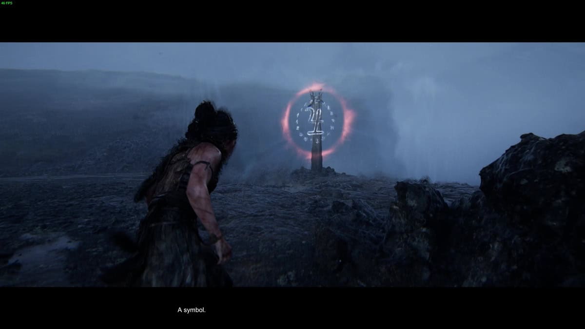 Hellblade 2 Lorestangir locations: Senua standing in front of a glowing runic totem.