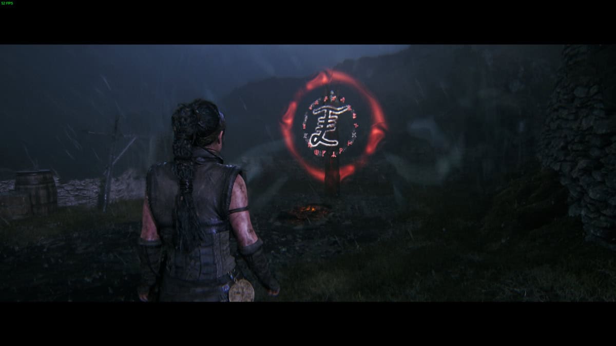 Hellblade 2 Lorestangir locations: Senua stands in front of a glowing red symbol in a misty, dark environment.
