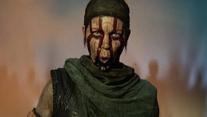 Screenshot from Hellblade 2 showing protagonist Senua grimacing at the camer.a