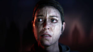 Hellblade 2 tips and tricks: Senua close-up with a worried look on her face.