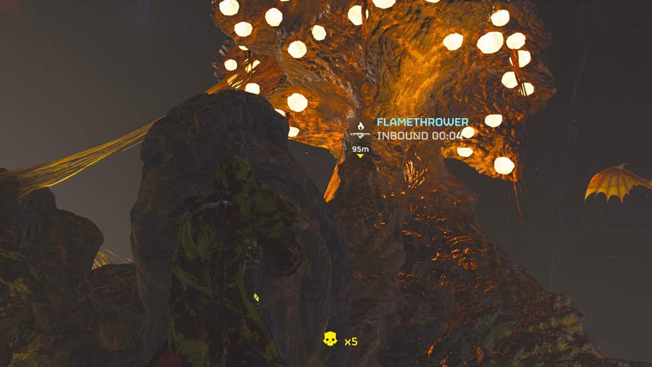 Helldivers 2 Fog Generators: A glowing orange mushroom towers over the player in the game. Image captured by VideoGamer.