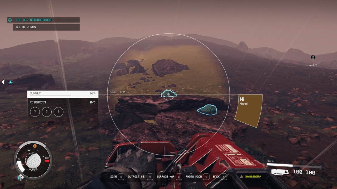 How to scan in Starfield: Player uses scanner mode to scan a rock.