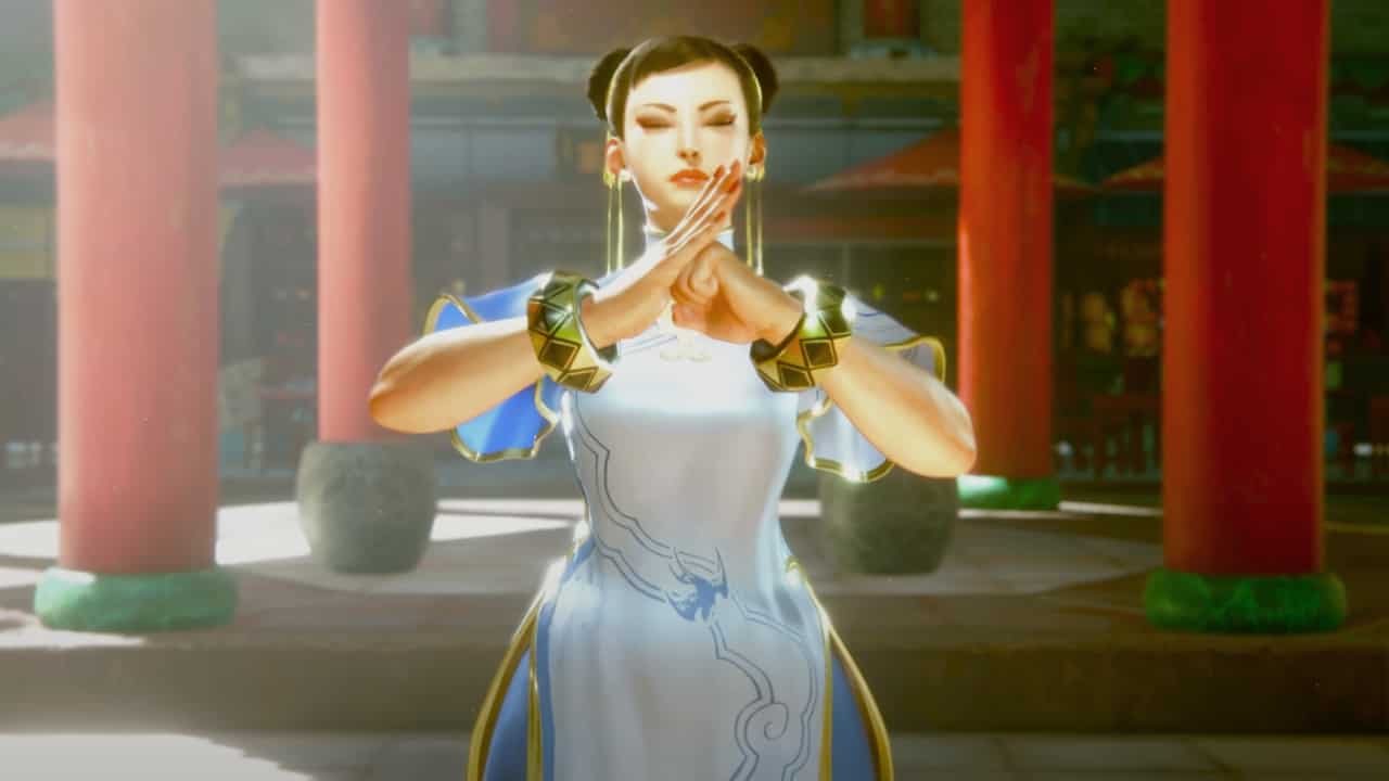 How to take photos in Street Fighter 6: Chun-Li bows to an opponent before the start of a fight.