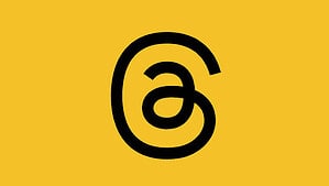 Instagram threads logo on a yellow background