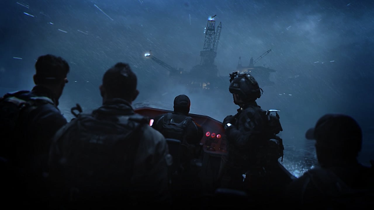A group of soldiers is standing in the dark.