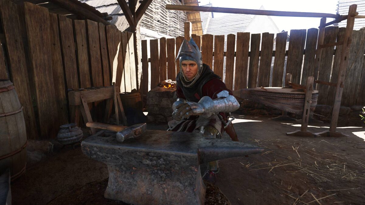 Kingdom Come Deliverance 2 smithing recipes: Henry crouching in front of an anvil.