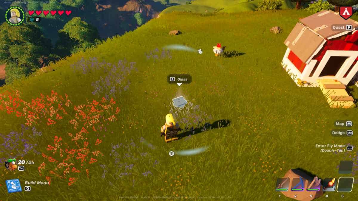 LEGO Fortnite how to get glass: A player standing next to glass on a grassy hill in LEGO Fortnite
