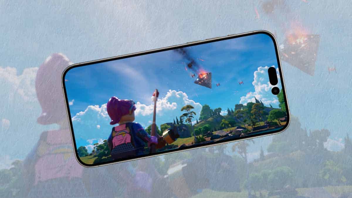 Smartphone displaying a scene from Fortnite with animated characters and explosions, set against a blurred background.