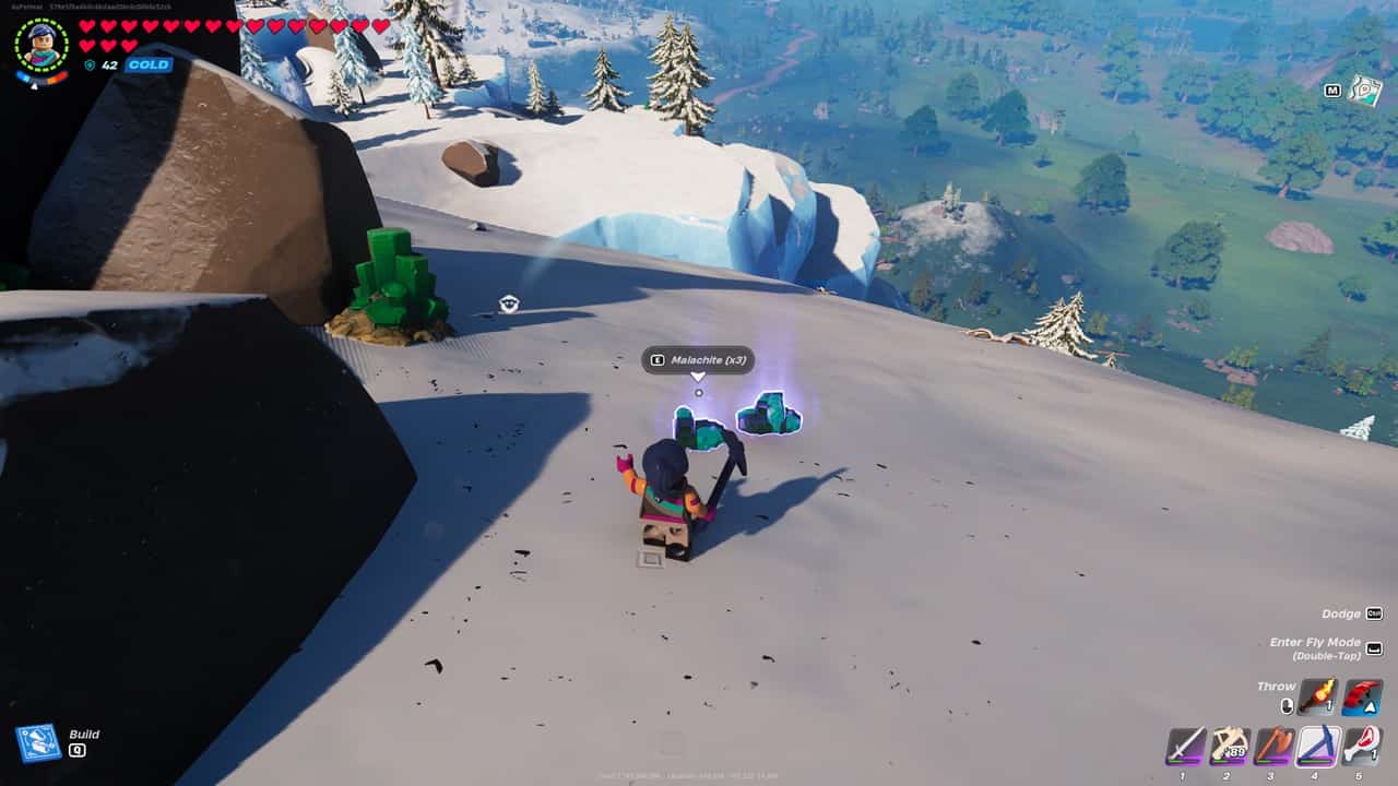 An image of a player collecting malachite in LEGO Fortnite. Image captured by VideoGamer.