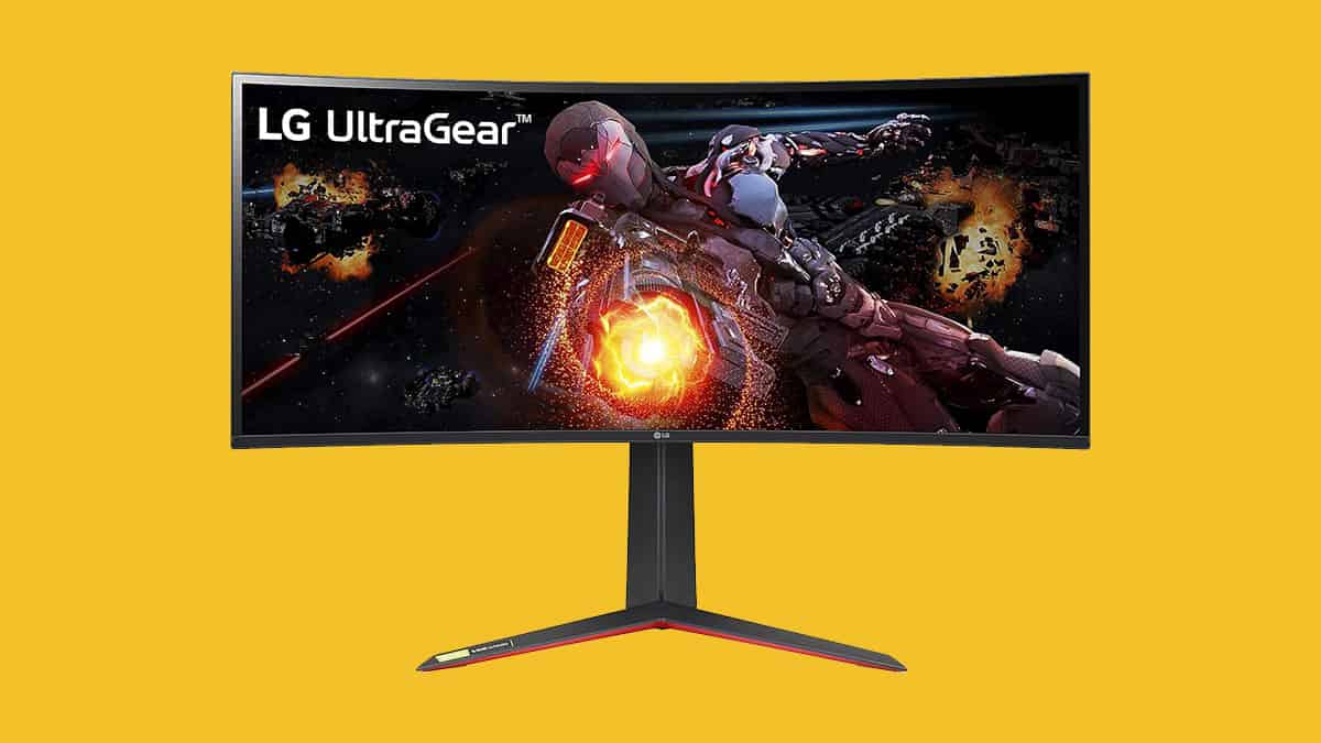 The Ultra Gear curved monitor by LG sits against a vibrant yellow backdrop.