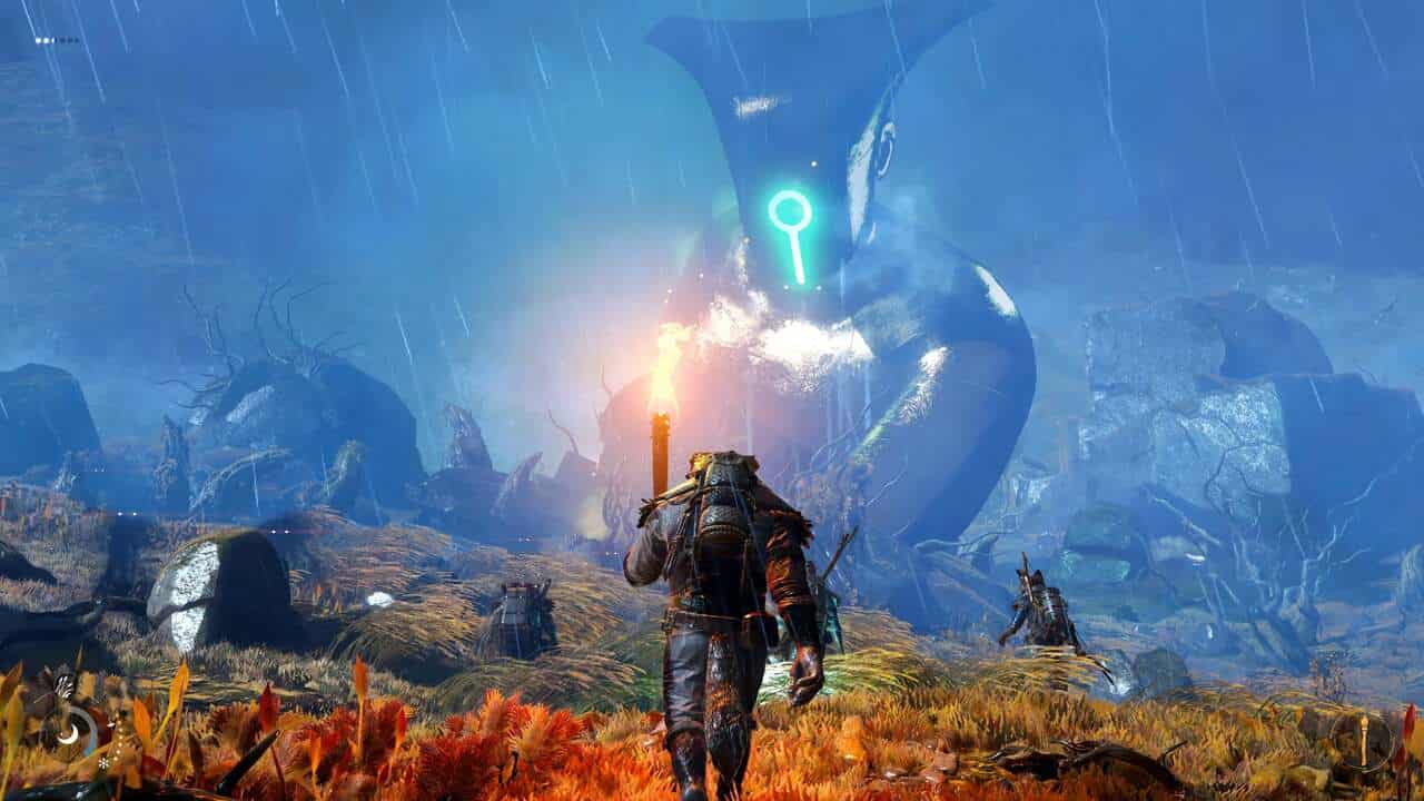 Light No Fire everything we know: A group of players walking towards a giant statue with a glowing face
