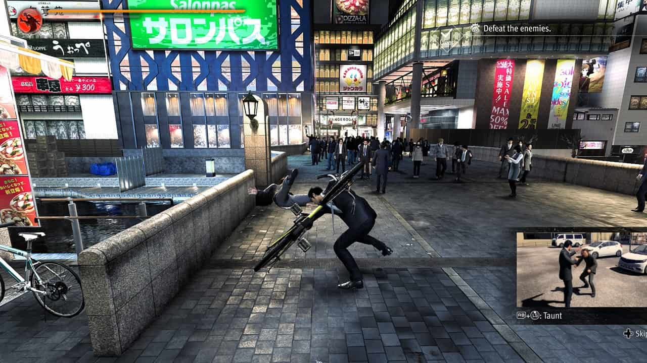 Like a Dragon Gaiden review: Kiryu uses a bicycle to fight enemies.