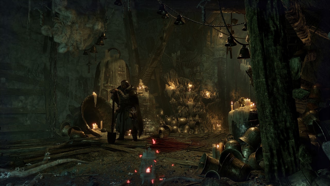 Lords of the Fallen review: Byron, the Vestige tender, stands watch near the Bellroom Vestige in a dilapidated cave.