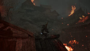 Lords of the Fallen tips and tricks to help you beat the game: A player stands on a rooftop in the fiery ruins of Lower Calrath