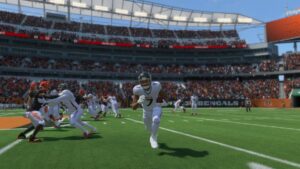 A screenshot of a football game in a stadium where Madden 24 players laugh at the hilariously accurate absence of Bijan Robinson.