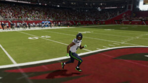 A football player competing in a Madden 24 video game, participating in a Division Dynasty league.