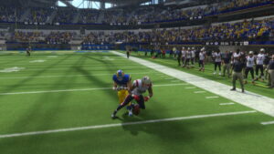 A screenshot of a Madden 24 football game with players on the field showcasing how to hit stick.