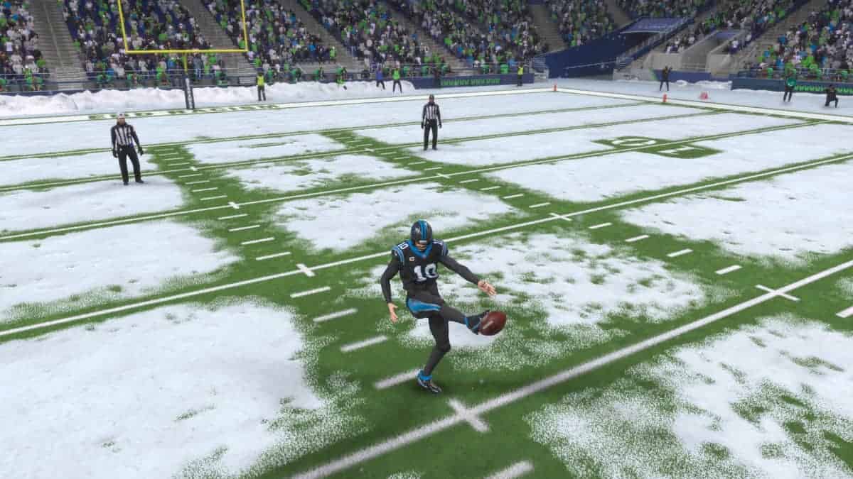 A Madden 24 game featuring a star punter kicking a football in the NFL.