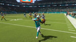 The Miami Dolphins are playing NFL football in a video game with Madden 24 announcers.
