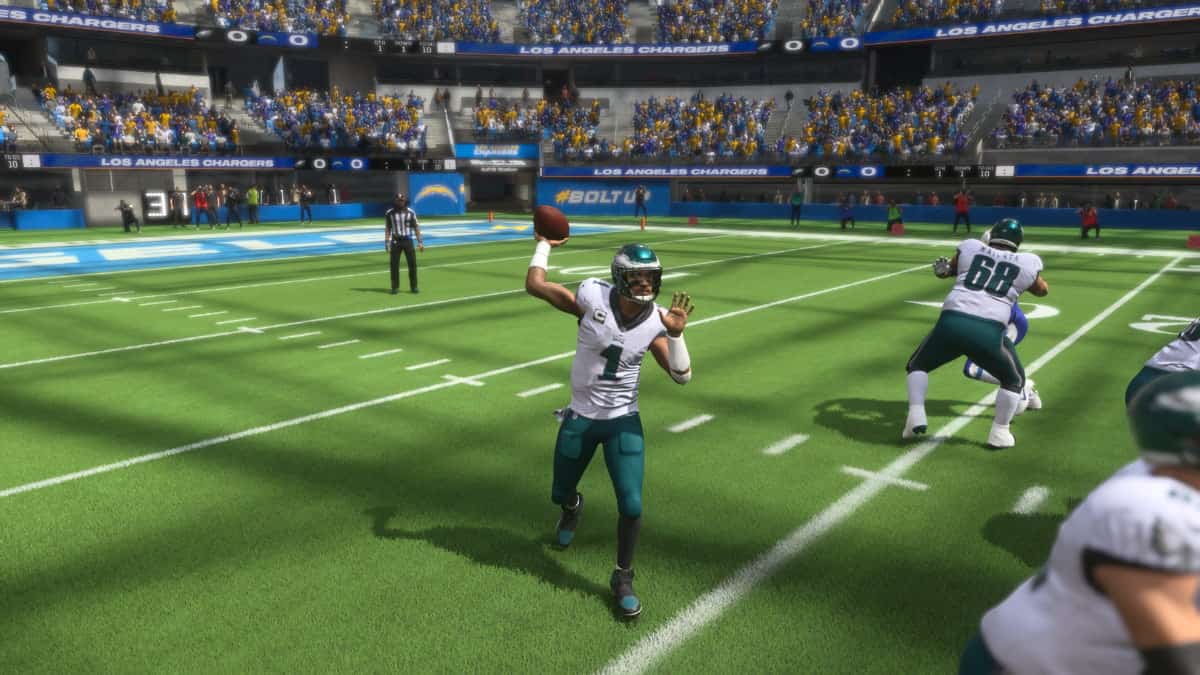 An nfl game featuring player throwing a ball and Madden 24.