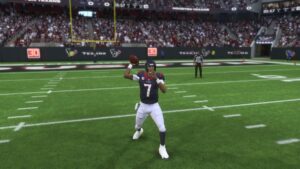 In Madden 24, a football player showcases their skills by accurately throwing the ball.