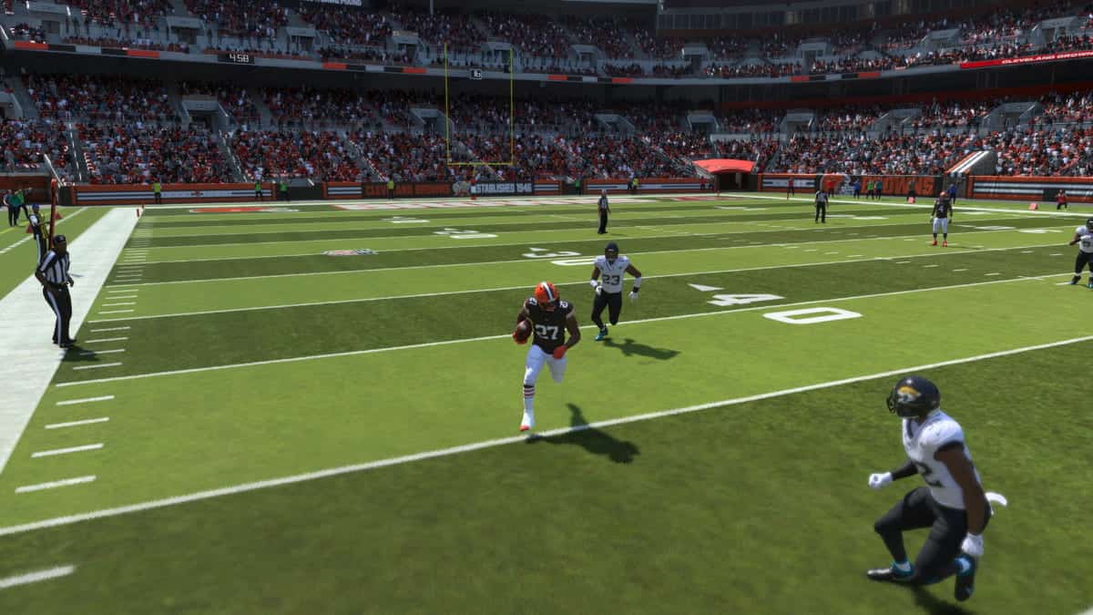 A football player participating in Madden 24's Team of the Week 7, running on a field with a crowd in the background.