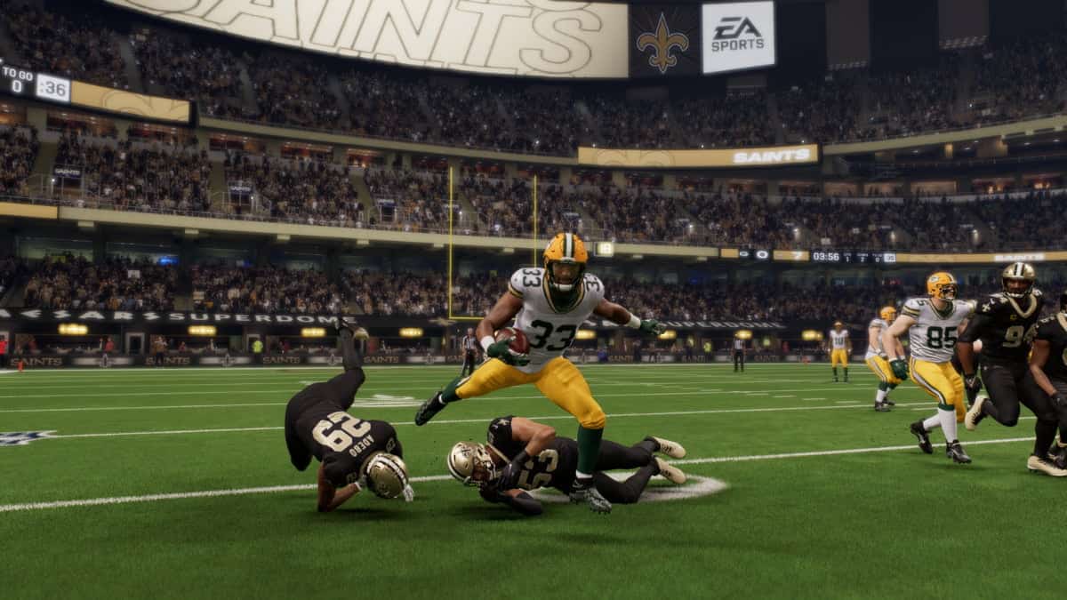 The Green Bay Packers, a football team known for their exceptional skills, are showcasing their talents on the field of a grand stadium.
