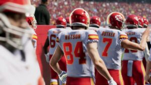 Madden 25 best teams: A football team in white jerseys walk out onto the field.