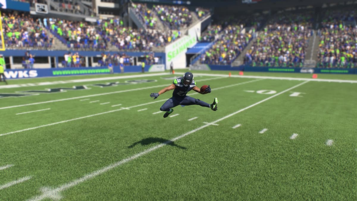 How to hurdle in Madden 25: Seahawks player attempts a hurdle.