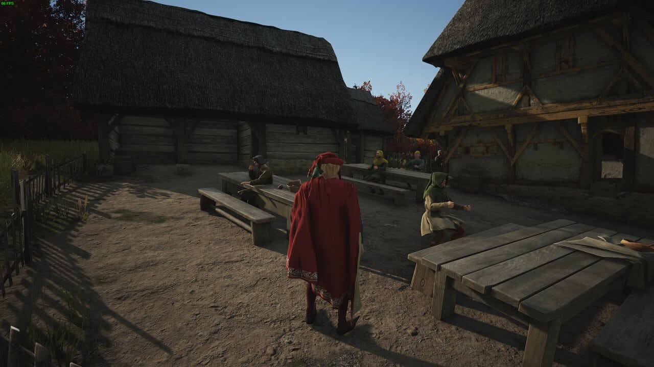 Manor Lords Ale: a lord in a red cloak surveying a tavern with outdoor tables.