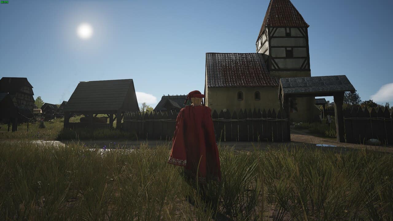 Manor Lords Approval: lord in a red cloak standing near a church in a medieval village.