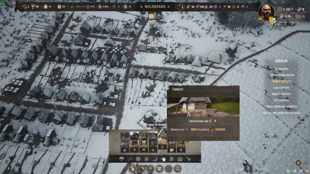 Manor Lords make Clothes: Tannery in building menu with aerial view of a town in the background.