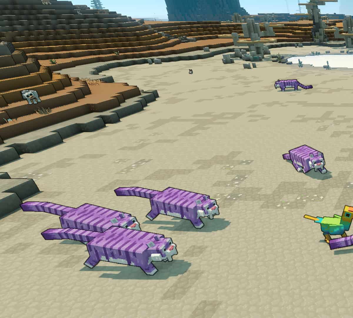 Minecraft Legends mounts: The player character riding the Regal Tiger in a desert.