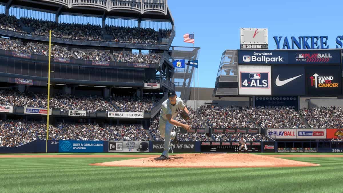 In a stadium, a baseball player is pitching the ball to his opponent.