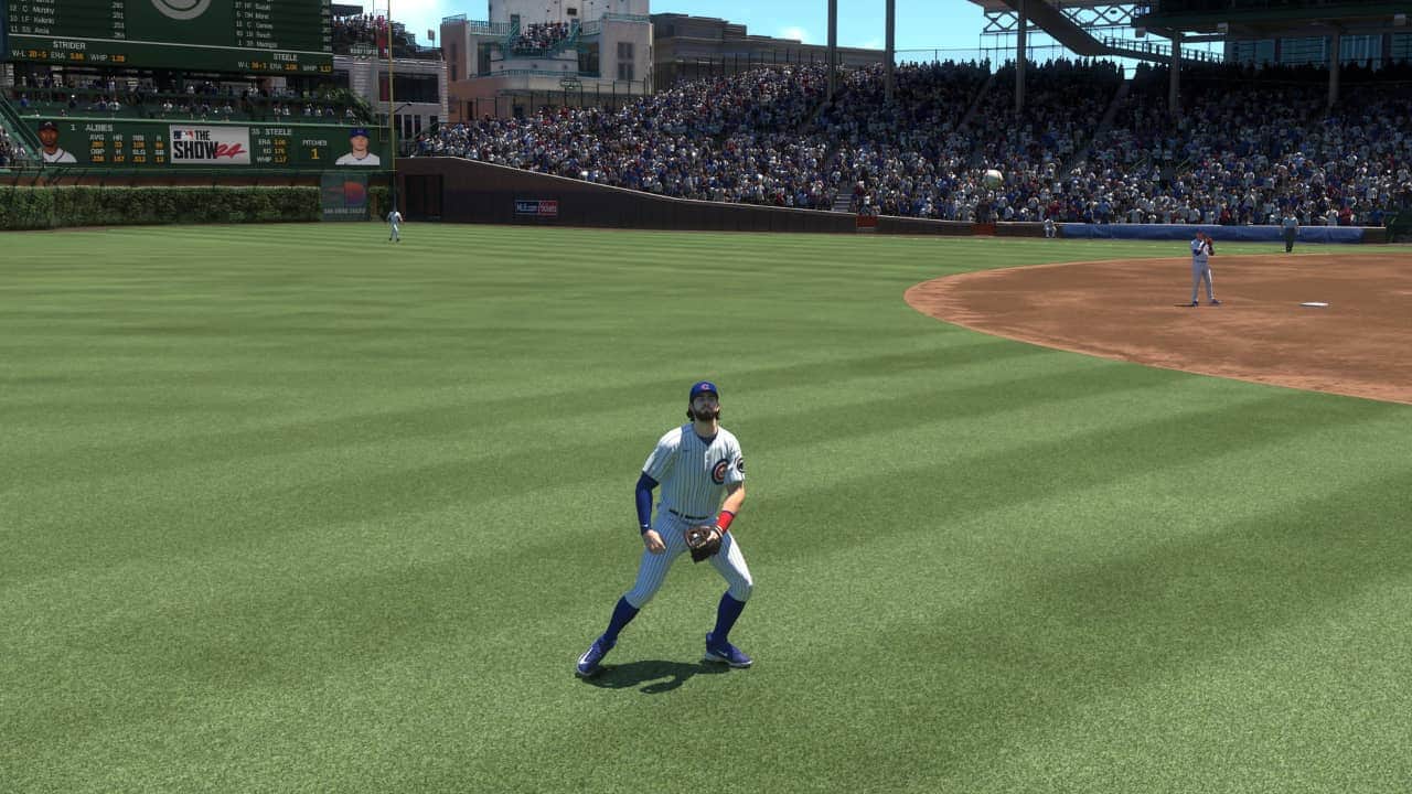 How to get stubs MLB the show 24: player in the outfield preparing to receive a ball.