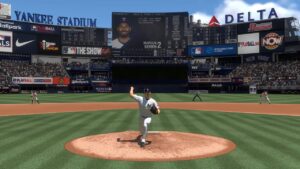 A pitcher mid-throw in an MLB The Show 24 baseball video game simulation set in Yankee Stadium.