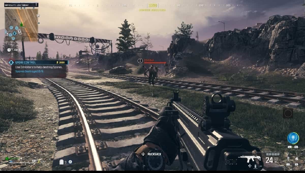 A screenshot of a video game on a train track with a gun, promising tips for leveling up quickly in MW3.