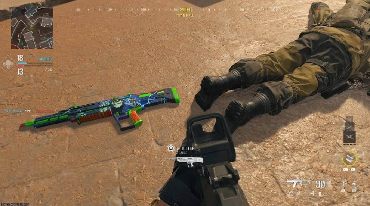 A soldier is laying on the ground with a gun, wearing Stalker Boots in MW3.