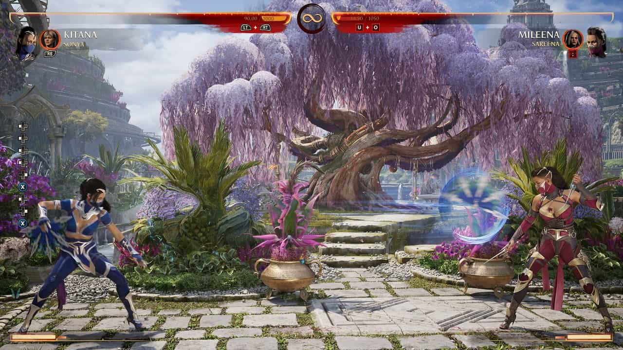 Mortal Kombat 1 Kitana: An image of Kitana fighting Mileena in the game.