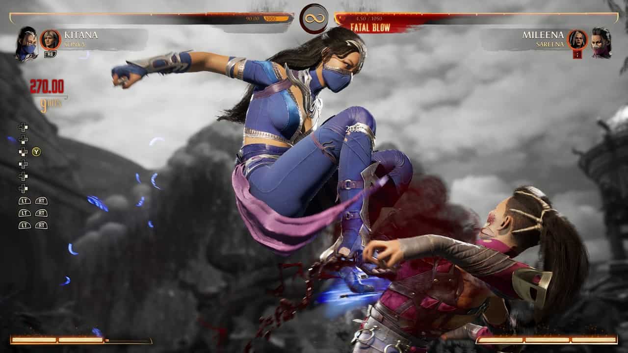 Mortal Kombat 1 Kitana: An image of Kitana fighting Mileena with her Fatal Blow in the game.