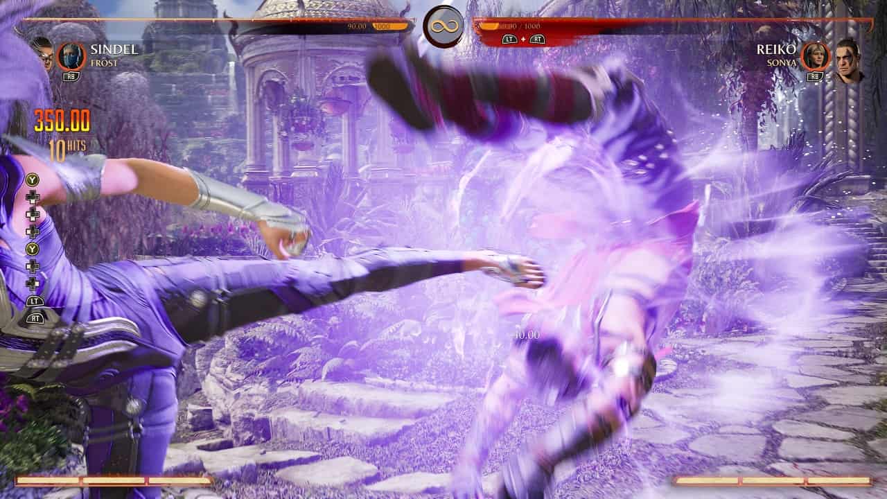 Mortal Kombat 1 Sindel: An image of Sindel fighting Reiko using her Fatal Blow in the game.