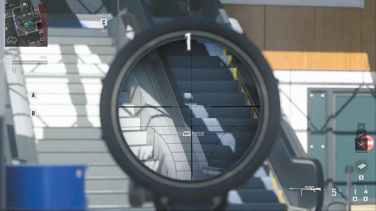 A sniper looks down their sight in MW3. Image captured by VideoGamer.