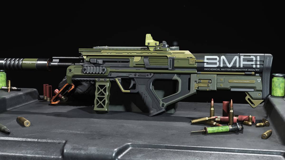 A futuristic green and black rifle.