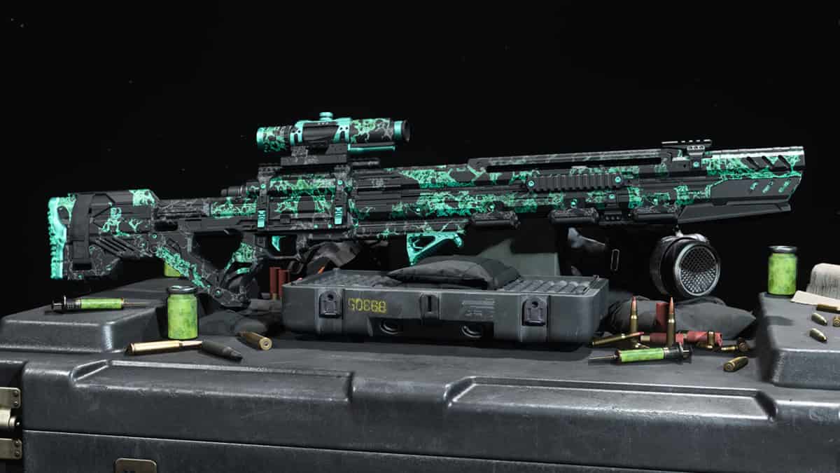 A futuristic sniper rifle with a green and black design.