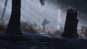 A man explores a darkened woods using a flashlight.