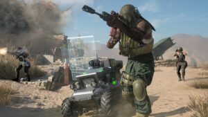 Three armed soldiers in tactical gear protect a MAW in the game.