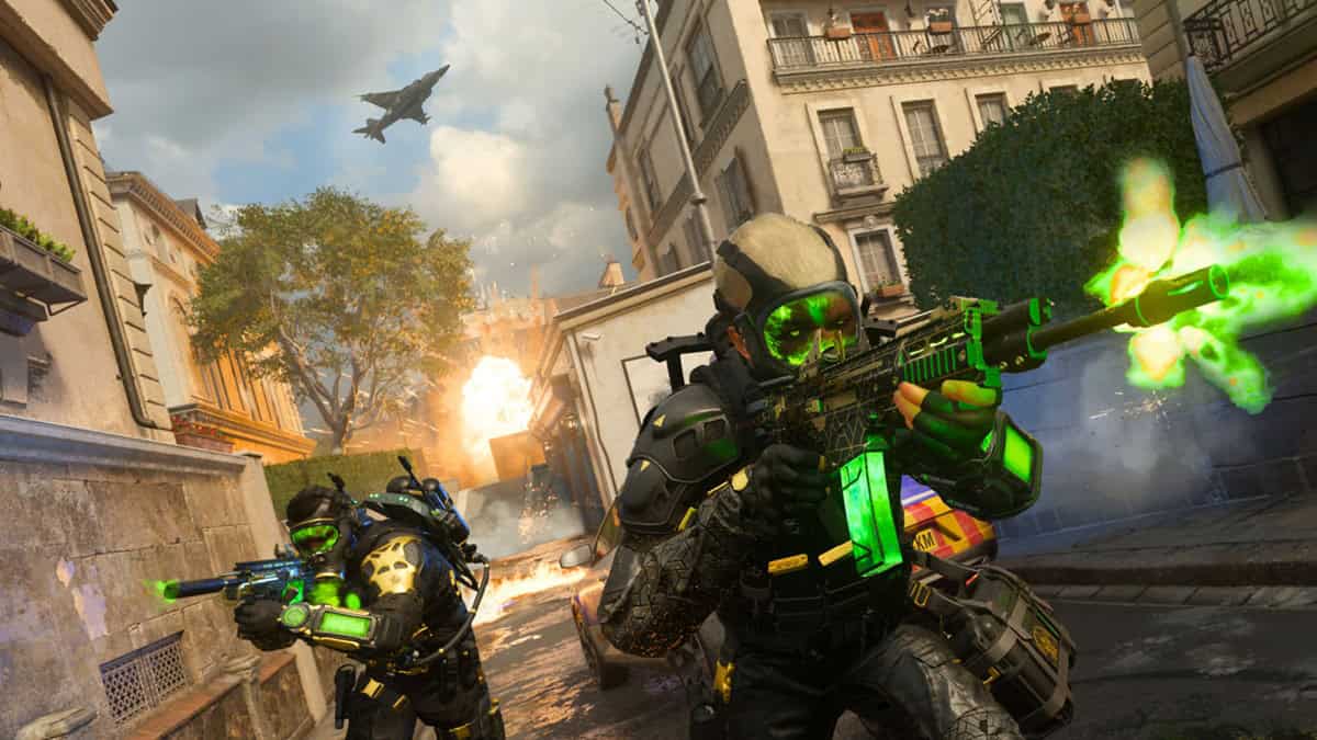 Two soldiers in futuristic gear fire shots at opponents.
